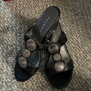 Pesaro Black Leather Slide Mules with Silver Medallion Details